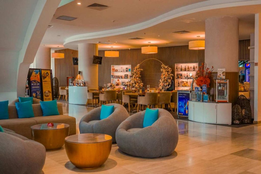 Lobby of a condotel in a coastal development with its dual benefits of flexible accommodation and real estate investment.