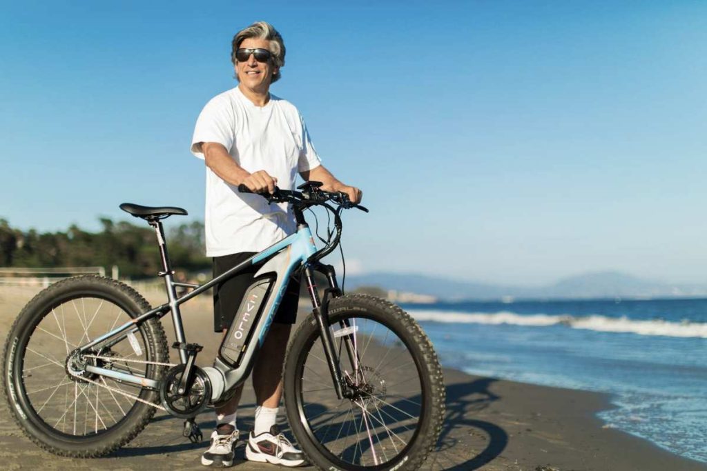 Rechargeable electric bikes for sustainable living options along coastal developments.