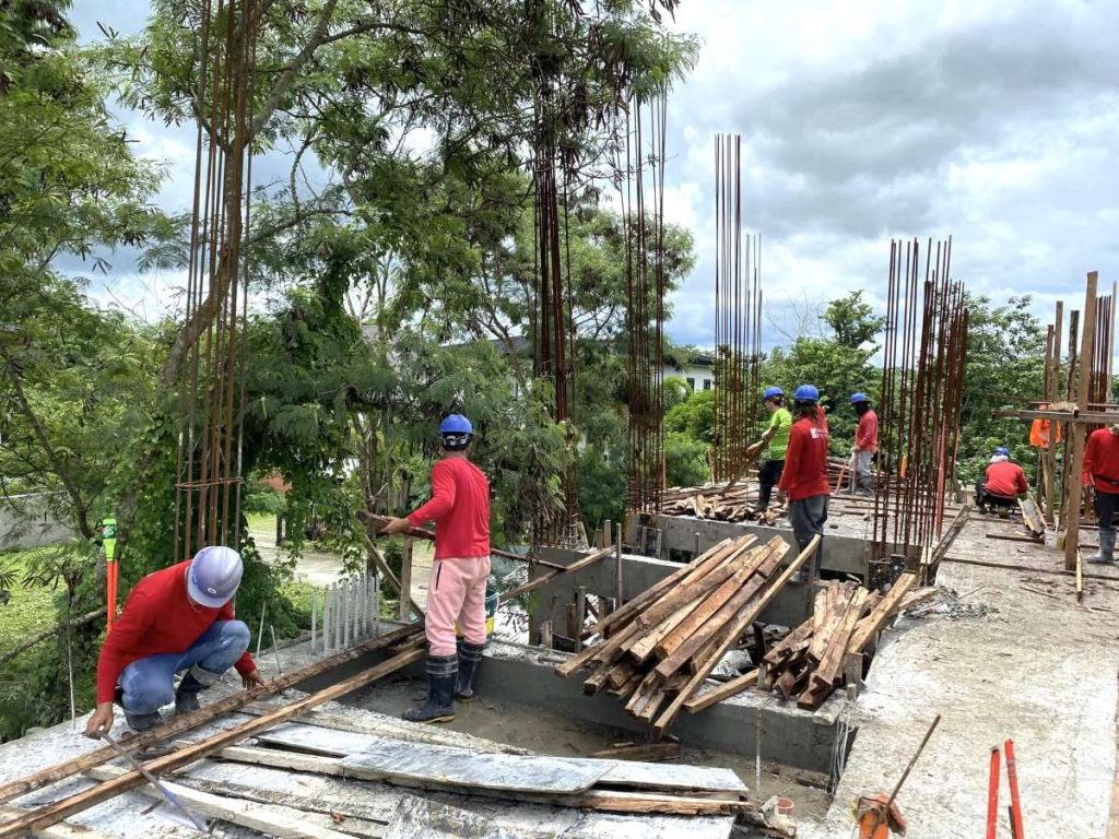 Construction workers building a house in Metro Manila