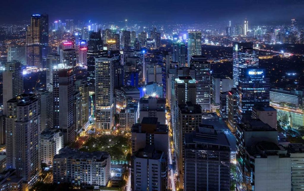 Night view of Makati financial district in the Philippines.